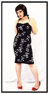 Show product details for Stella Dress in Black With White Hawaiian Flowers by Collectif/Guilty Clothing - SALE