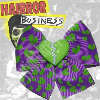 Show product details for Green Broken Heart With Purple Hair Bow by Kreepsville 666