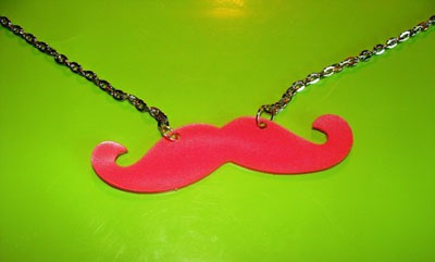 Show product details for Pink Dali Mustache Necklace by Little Angels