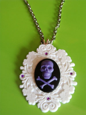 Show product details for Purple & White Skull Cameo Necklace by Little Angels