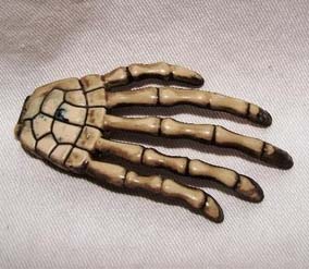Show product details for Skeleton Hand Hair Clip by Little Angels