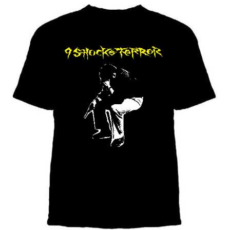 9 Shocks Terror- Guy With Gun on a black shirt