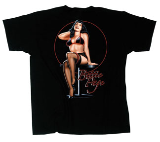 Bettie Page- Bettie Sitting On Table on a black shirt