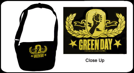 Show product details for Green Day- Yellow Crest on a black messenger bag