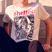 Shelter- Logo on front, Symbol on back on a natural shirt