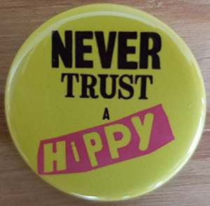 Never Trust A Hippy (Bollocks) pin (pin-C91)
