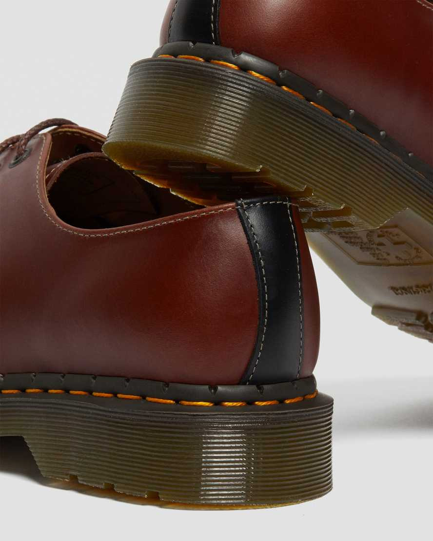 3 Eye Brown & Black Abruzzo Shoe by Dr. Martens