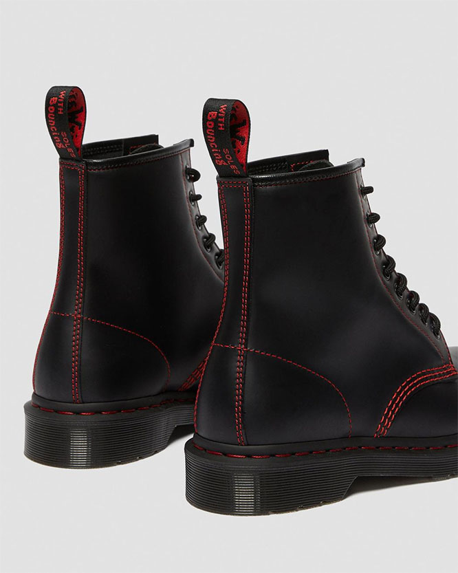 black boots red zipper up back