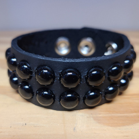 2 Rows Of Black Round Studs on a Black Leather Snap Bracelet by Funk Plus
