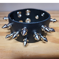 3 Row Of 1/2" Spikes on a Black Leather Snap Bracelet by Funk Plus