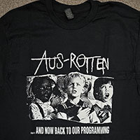 Aus Rotten- And Now Back To Our Programming on front, Consume on back on a black shirt