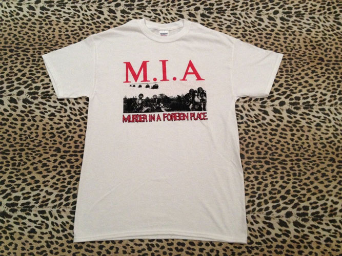 MIA- Murder In A Foreign Place on a white YOUTH sized shirt